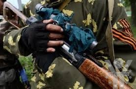 Біля Кримського бойовики, користуючись затишшям, забирають трупи своїх загиблих
